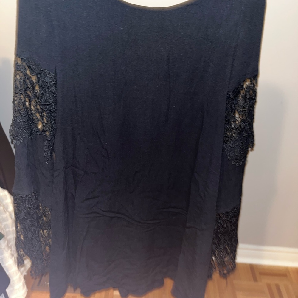 A line dress with lace detailing on sleeves